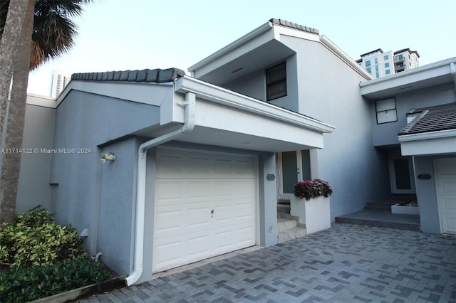 view of front of home with a garage