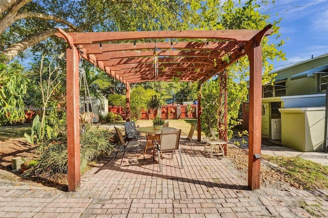 view of patio featuring a pergola