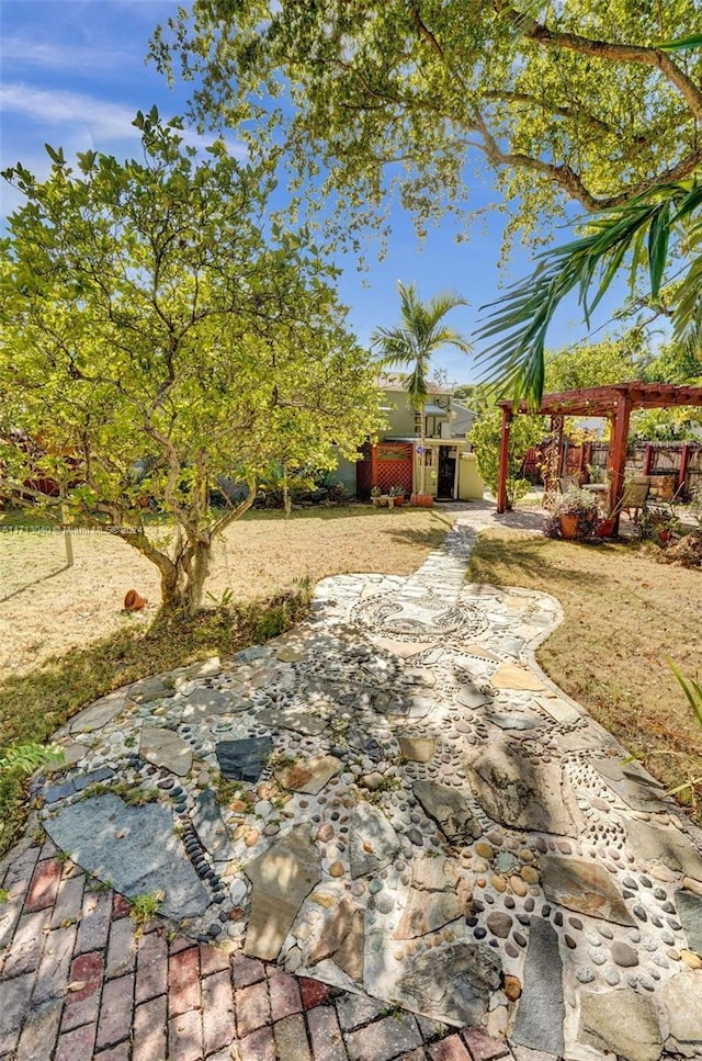 view of yard with a pergola