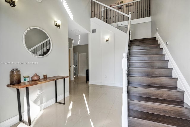 stairs with a towering ceiling