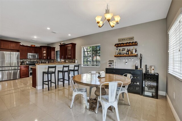 dining room featuring a chandelier