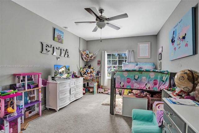 playroom with ceiling fan and carpet floors