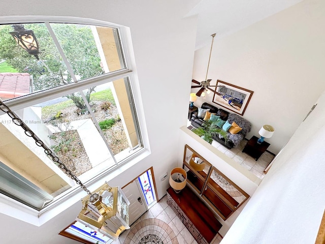 interior space featuring ceiling fan