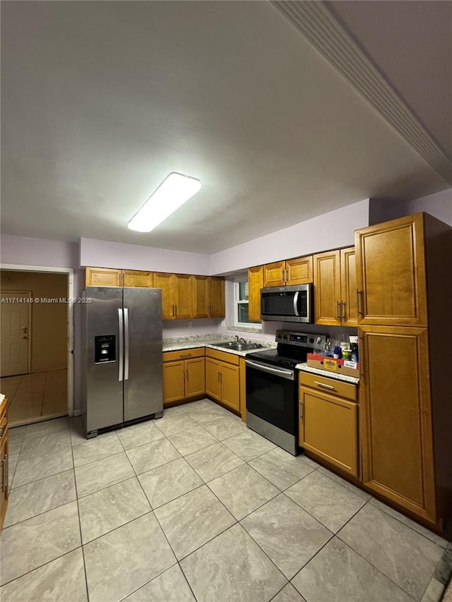 kitchen featuring sink and appliances with stainless steel finishes