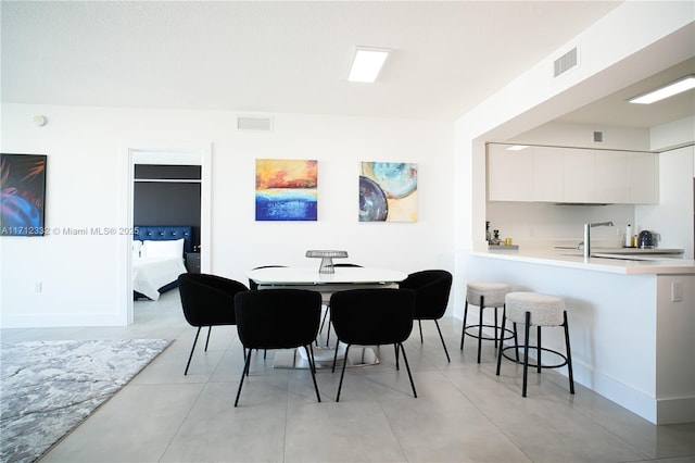 dining room featuring sink