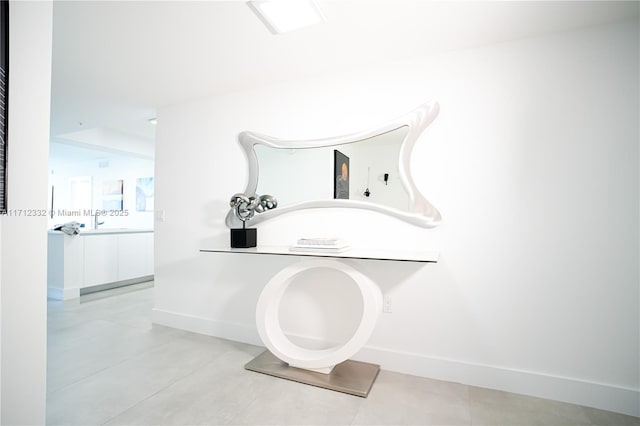 bathroom with tile patterned flooring and vanity