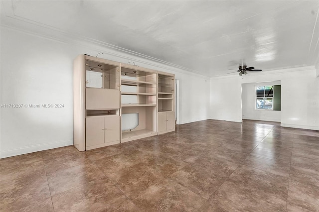 unfurnished living room featuring ceiling fan and crown molding