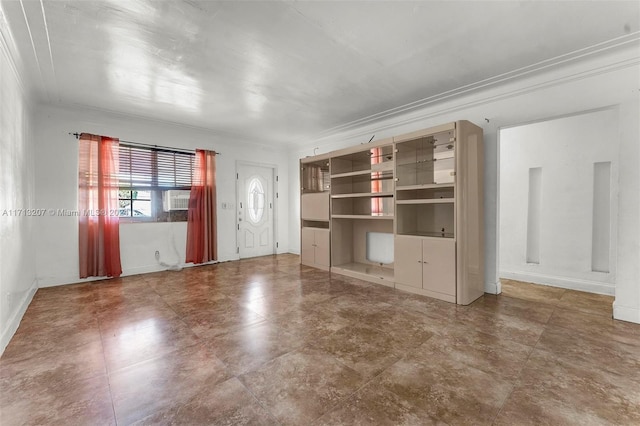 unfurnished living room with cooling unit and ornamental molding