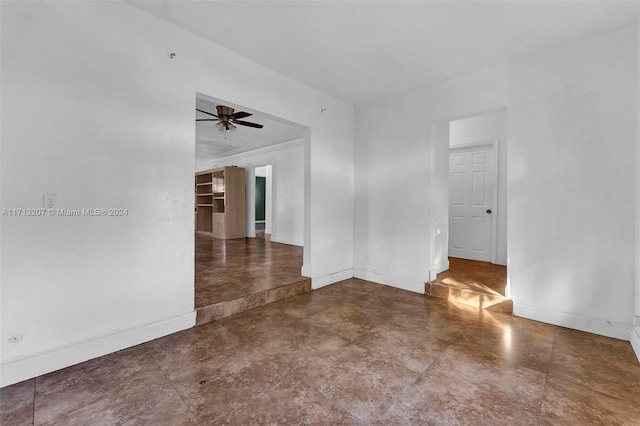 spare room with ceiling fan