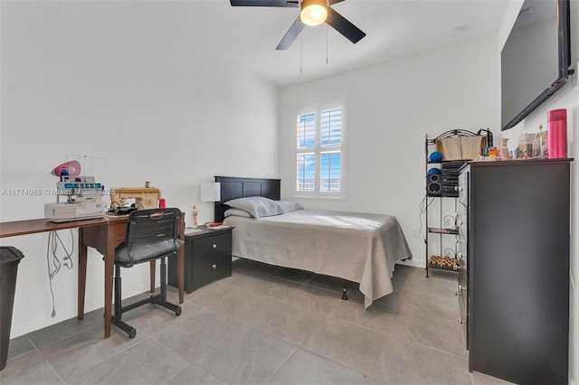 bedroom with light tile patterned flooring and ceiling fan