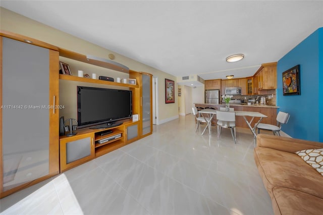 tiled living room with sink