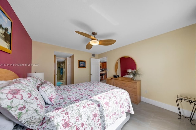 bedroom with ceiling fan and light tile patterned floors