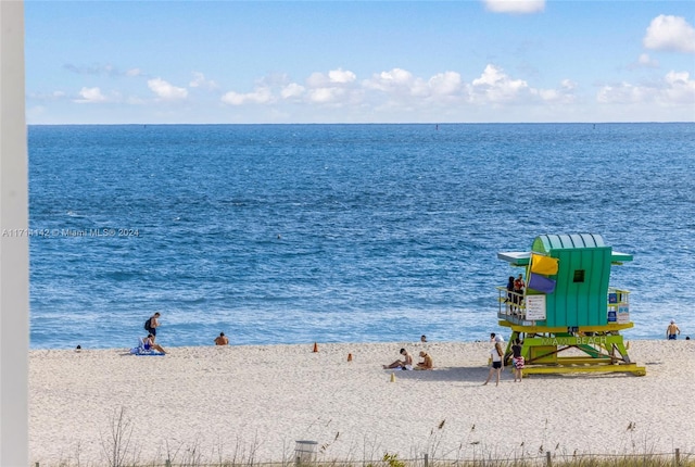 view of water feature with a beach view