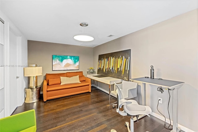 sitting room featuring dark hardwood / wood-style floors