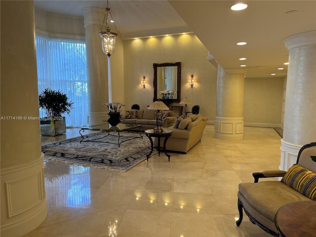 3530 Mystic Pointe Dr Unit 2602, Aventura, FL 33180 - building lobby featuring a decorative wall, wainscoting, recessed lighting, and ornamental molding