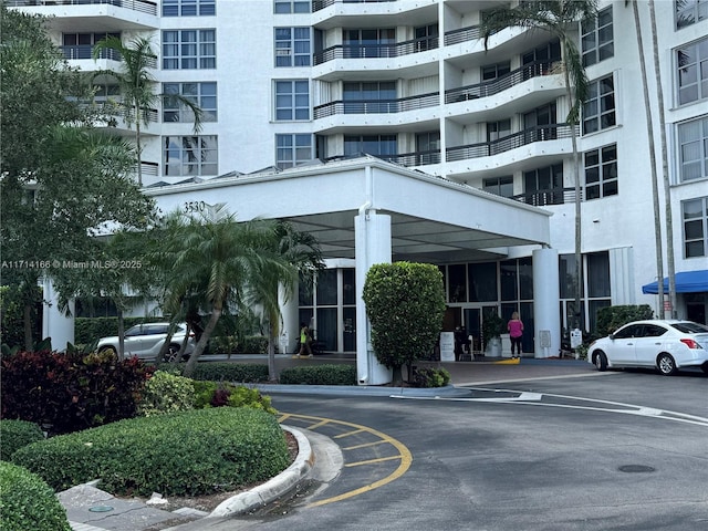3530 Mystic Pointe Dr Unit 2602, Aventura, FL 33180 - view of apartment building / complex with uncovered parking