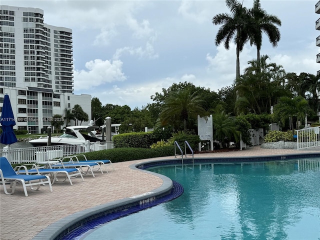 3530 Mystic Pointe Dr Unit 2602, Aventura, FL 33180 - community pool featuring a patio