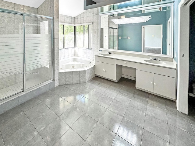 bathroom with tile patterned flooring, vanity, lofted ceiling, and plus walk in shower