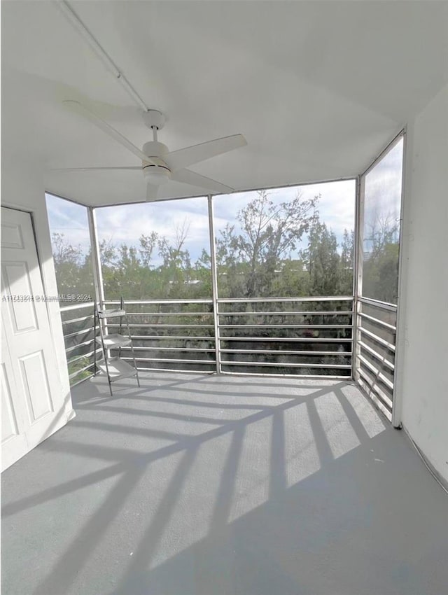 view of patio / terrace featuring a balcony and ceiling fan