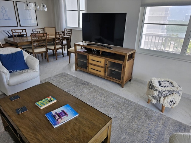 living room featuring light tile patterned flooring