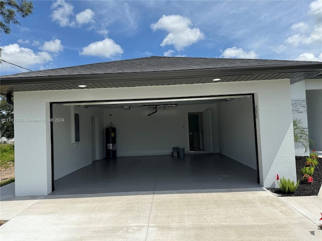 garage featuring electric water heater