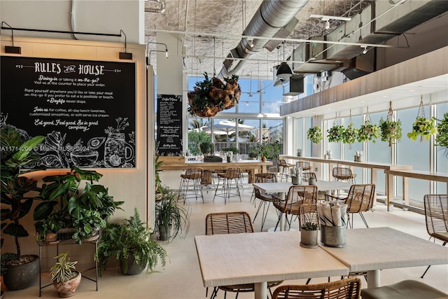 dining room featuring a high ceiling