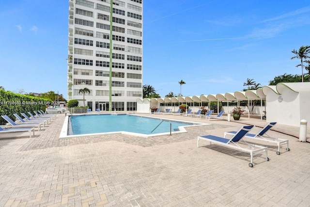 pool with a patio