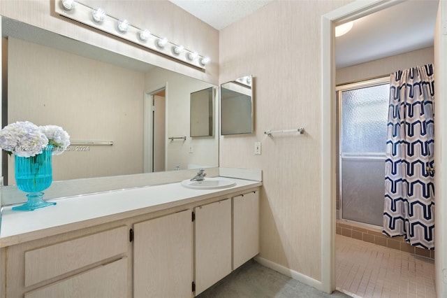 bathroom featuring vanity and walk in shower