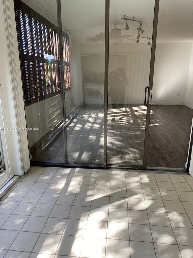 unfurnished bedroom featuring light tile patterned floors