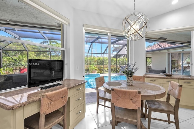 821 E Cypress Pointe Dr E, Pembroke Pines, FL 33027 - dining space featuring a sunroom, light tile patterned floors, and a chandelier