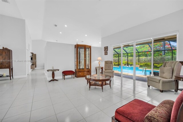 821 E Cypress Pointe Dr E, Pembroke Pines, FL 33027 - living room with a sunroom, light tile patterned floors, and recessed lighting