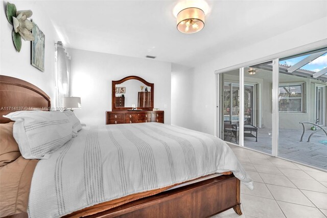 821 E Cypress Pointe Dr E, Pembroke Pines, FL 33027 - bedroom with access to outside and tile patterned flooring