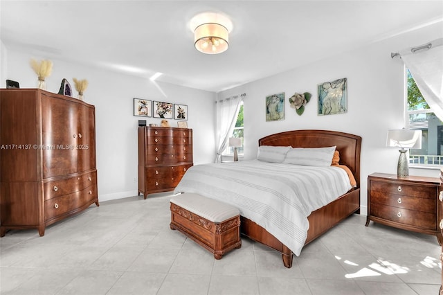 821 E Cypress Pointe Dr E, Pembroke Pines, FL 33027 - bedroom with light tile patterned floors