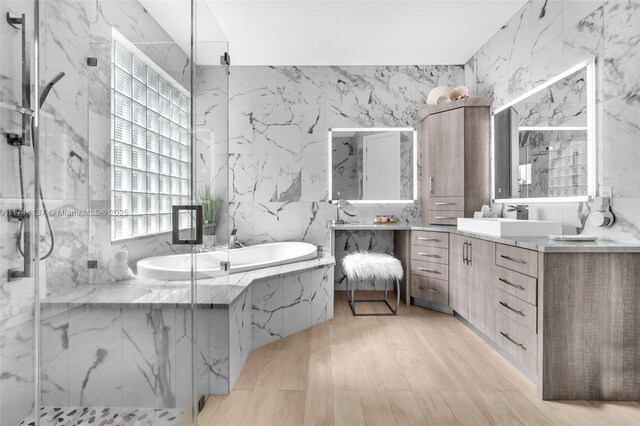 821 E Cypress Pointe Dr E, Pembroke Pines, FL 33027 - full bathroom featuring vanity, a bath, a marble finish shower, and wood finished floors