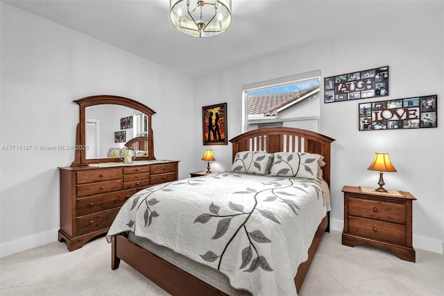 821 E Cypress Pointe Dr E, Pembroke Pines, FL 33027 - bedroom featuring light tile patterned floors and a chandelier