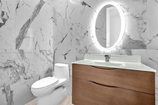 821 E Cypress Pointe Dr E, Pembroke Pines, FL 33027 - bathroom featuring tile walls and vanity