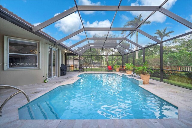 821 E Cypress Pointe Dr E, Pembroke Pines, FL 33027 - view of swimming pool featuring a patio and a lanai