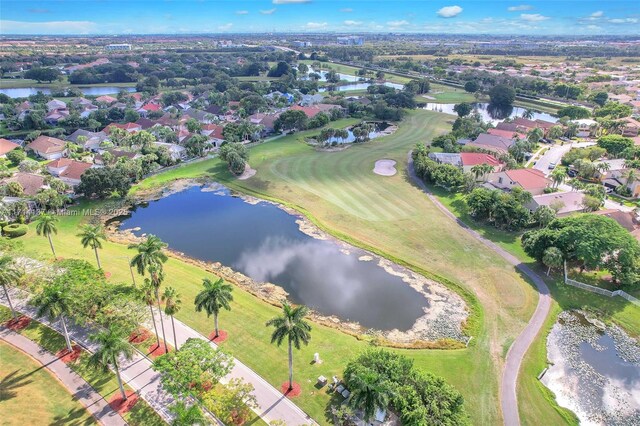 821 E Cypress Pointe Dr E, Pembroke Pines, FL 33027 - aerial view of property and surrounding area featuring a large body of water and nearby suburban area
