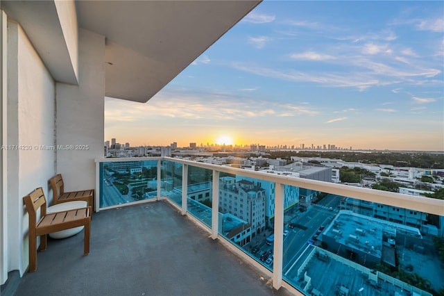 view of balcony at dusk