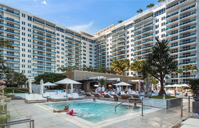 view of swimming pool with a patio