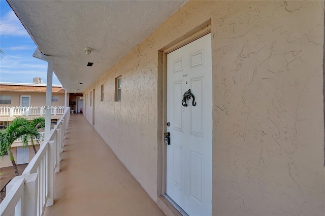 doorway to property featuring a balcony