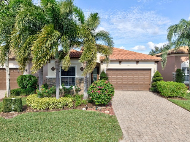 mediterranean / spanish-style home featuring a garage