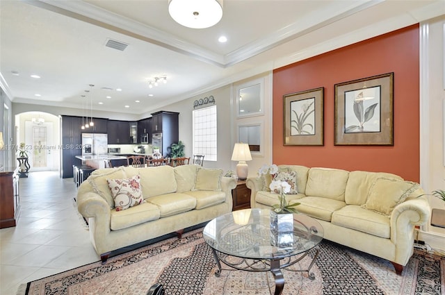 tiled living room with crown molding