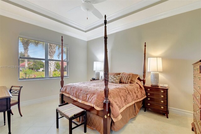 bedroom featuring ceiling fan, a raised ceiling, and ornamental molding