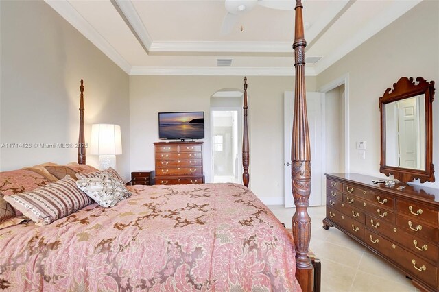 tiled bedroom featuring crown molding