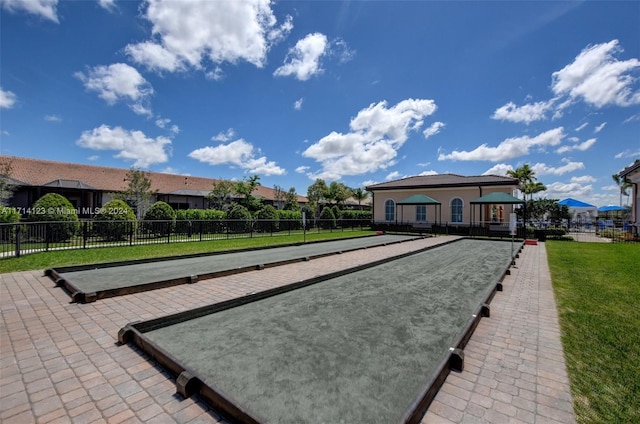 view of home's community featuring a lawn