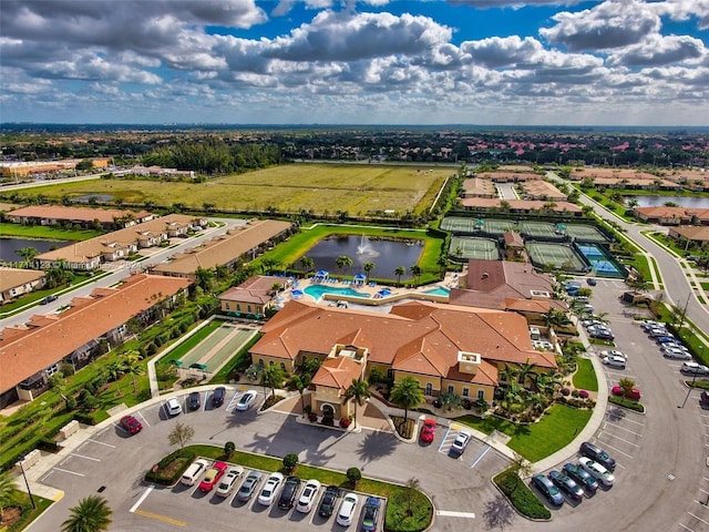 birds eye view of property featuring a water view