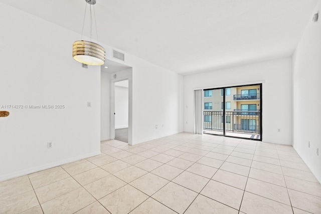 view of tiled spare room