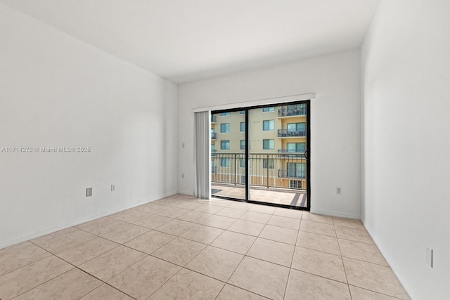 view of tiled spare room