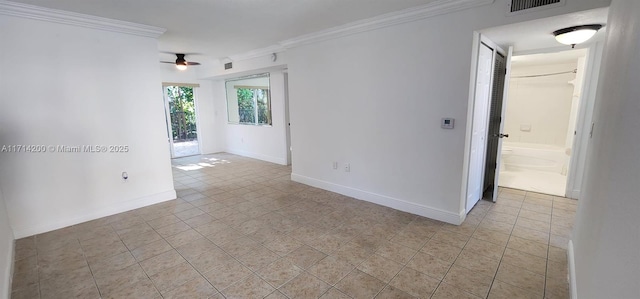 spare room with light tile patterned floors, ornamental molding, and ceiling fan